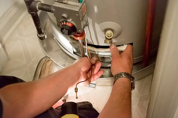 Man Fixing Furnace HVAC Repair